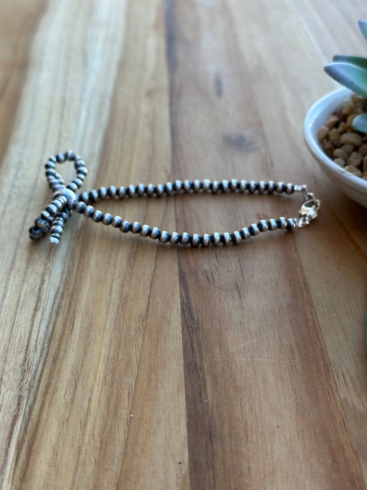 8" Single Strand Sterling Pearl Bow Bracelet