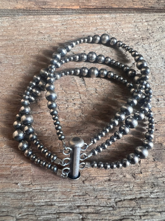 Multi Strand Silver Pearl Bracelet